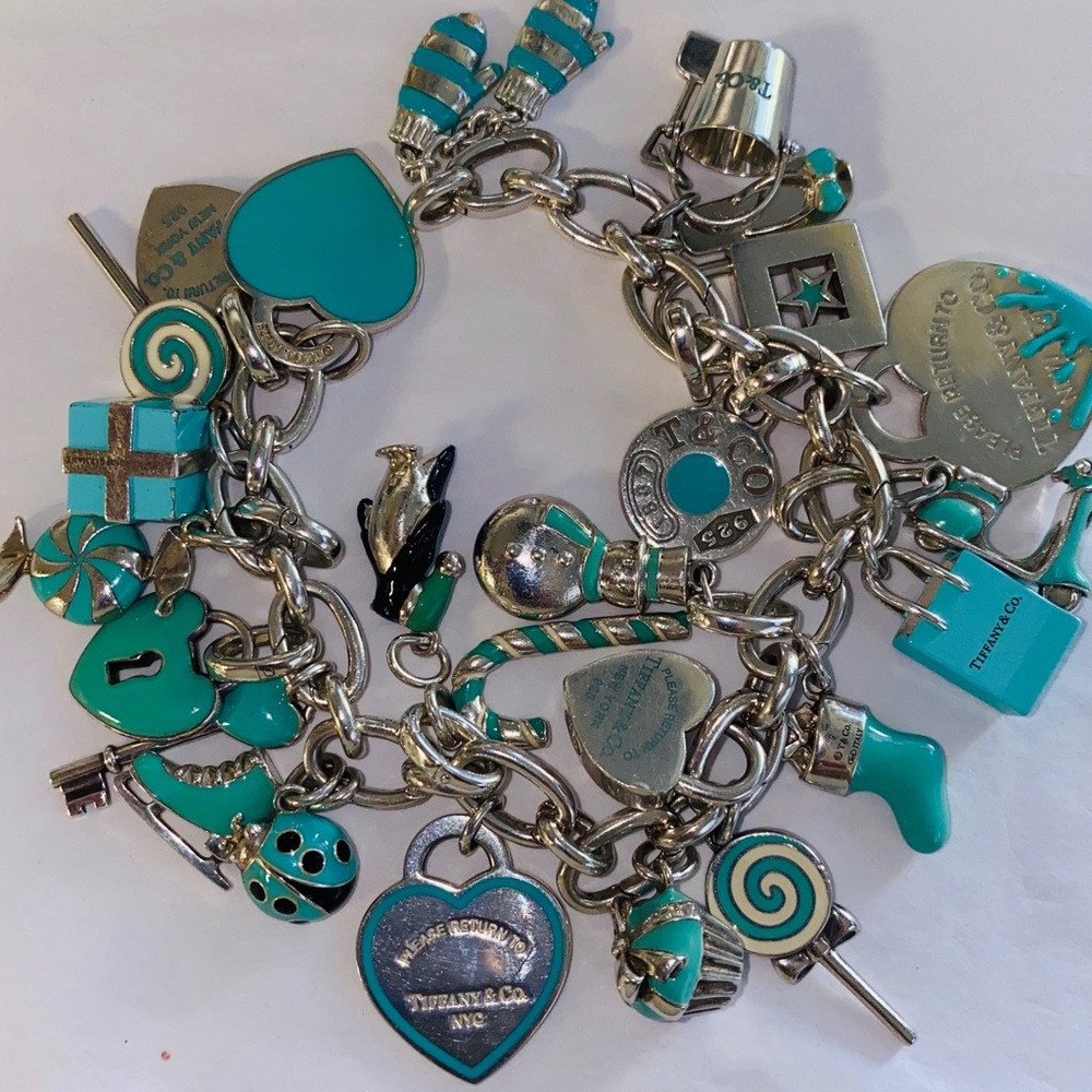 Tiffany & Co clasping link bracelet with charms